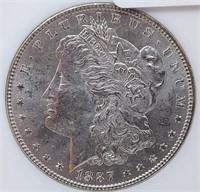 1887/6 $1 NGC MS 63
