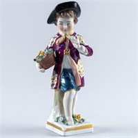 CHELSEA PORCELAIN FIGURE OF A YOUNG BOY