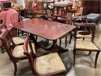 Table w/ 7 chairs. Chairs need reupholstered.