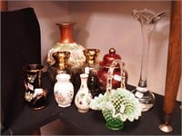 Nine decorative items: six vases including