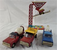 Vintage Japanese tin toy set with Chevy trucks,