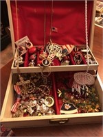 Box full of costume jewelry