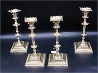 Set of (4) Georgian style candlesticks.