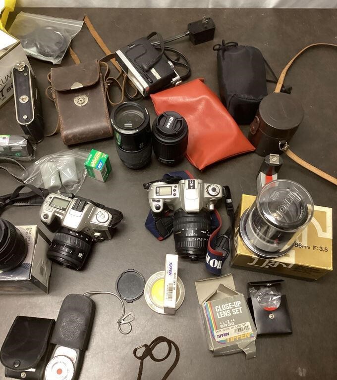 Cameras and Assortment of Lens