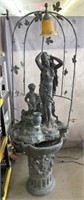 Figural Fountain with Decorative Lamp