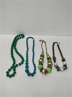 4 vintage necklaces with bling