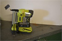 RYOBI - "AIRSTRIKE" NAIL GUN WITH BATTERY & CHARGR