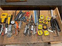 Drawer, full of tools knives Scissors etc.
