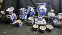 Blue/white pitcher , cups wall hangings