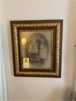 Early picture of children in a gilded frame