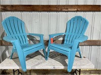 Two resin lawn chairs