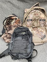 3 hunter/ fishing backpacks.  Look at the photos