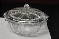 A Round Glass Candy Dish With Lid