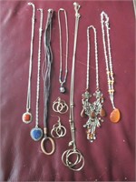 7 necklaces with 1 pair of matching earrings