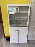 Metal cabinet with sliding glass doors