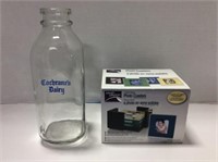 Milk Bottle ‘Cochrane’s Dairy’, Solid Glass