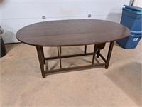 Drop Leaf oval table 65"L 43"W, 19"folded
