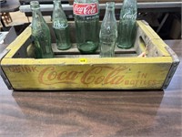 COKE BOTTLES IN CRATE