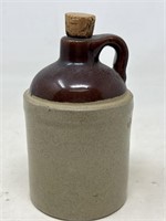 Small stoneware jug with cork unmarked