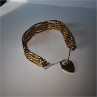Wide 10K Yellow Gold Bracelet with "Heart" Closure