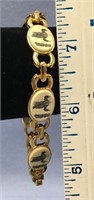 7 1/2" scrimmed bracelet of loons in gold alloy se