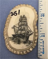 2 21/" fossilized platchet scrimmed with a sailing