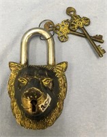 5 1/5" engraved brass lock with keys, has lions fa