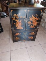 Asian black lacquered cabinet