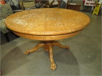 SOLID OAK ROUND TABLE WITH CLAW FEET