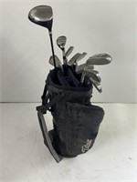 Golf bag with assorted golf clubs
