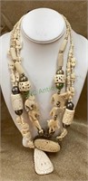 Vintage ivory like jewelry made in India - two