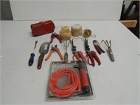 Box of garden tools and transfer pump
