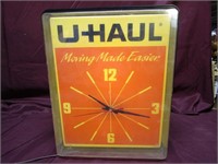 Lighted U-Haul Moving truck sign clock.