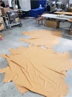 Pair of tan leather hides
