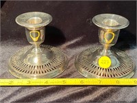 PAIR OF SILVER PLATED CANDLE HOLDERS