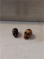 2 Carved Bone Skull Heads