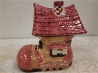 Shoe House cookie jar, has flake off top see pic