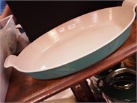 Turquoise and off-white Le Creuset oval baking
