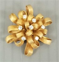Tested 10K gold artisan bow pin set with diamonds