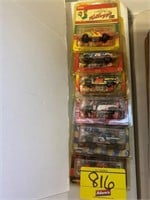 ROW OF DIECAST NASCARS IN PACKS