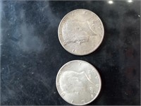 Two 1964 Kennedy silver half dollars