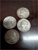 Two 1959 and two 1957 silver quarters