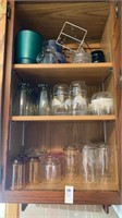 Contents of cupboard, glasses, mugs