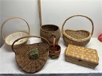 Large box of assorted wicker baskets