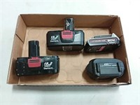 assortment of cordless tool batteries