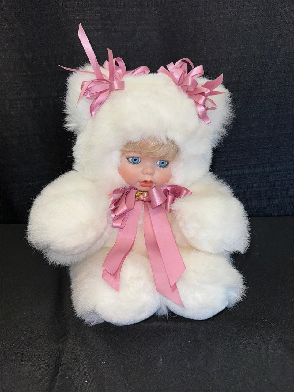 Doll in plush outfit