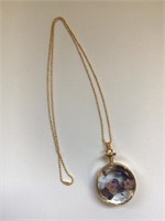 Beautiful Gold Floral encompassed in glass Necklac