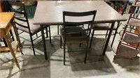 Metal table and four chairs