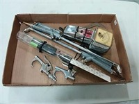 assortment of air tools, testers