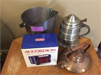 Accordion and metal pots